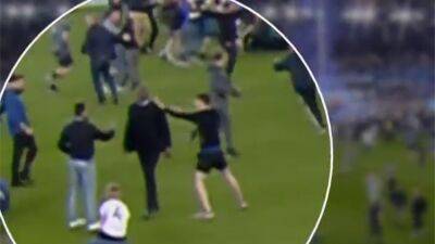 Patrick Vieira involved in altercation with fan during pitch invasion at Goodison Park as Everton beat relegation