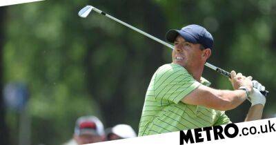Rory McIlroy steals the show at US PGA as Tiger Woods limps to a 74