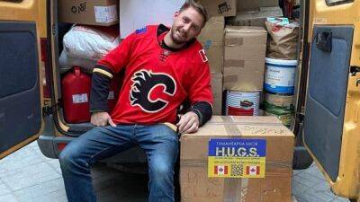 Canadian volunteer in Ukraine roots for the Calgary Flames - cbc.ca - Russia - Ukraine -  Ottawa - county Rock