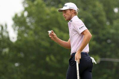 Zalatoris seizes PGA lead while Tiger makes the weekend