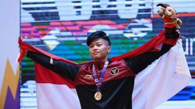 Rahmat Erwin Abdullah Wins Gold, Breaking SEA Games Weightlifting Record