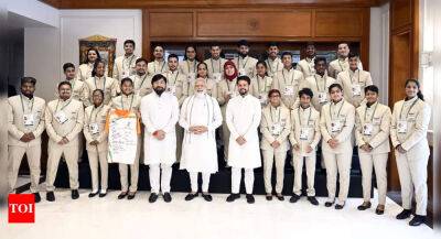 Anurag Thakur - PM Modi hosts Deaflympics contingent, says 'you brought pride and glory for India' - timesofindia.indiatimes.com - Brazil - India