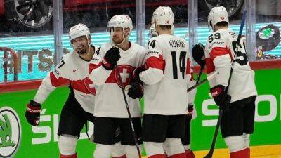 Adam Lowry - Switzerland hands Canada first loss to stay perfect at men's worlds - tsn.ca - Denmark - Switzerland - Canada - county Kent - county Johnson -  Helsinki