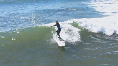 Riding the waves off Nova Scotia, this surfer says she felt cancer-free