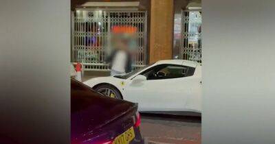 Evening News - Shocking moment man smashes up Ferrari as row erupts on Deansgate - manchestereveningnews.co.uk - Manchester