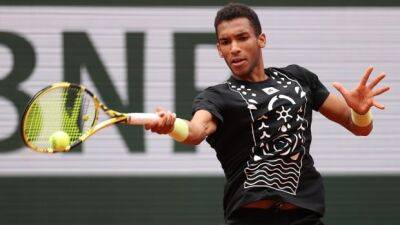 Canada's Auger-Aliassime rallies for 5-set win at French Open