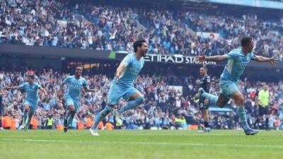 Man City roar back against Villa to retain the Premier League