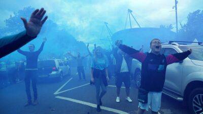 Manchester City fans get the party started - in pictures