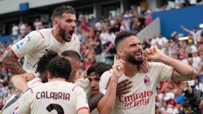 Giroud helps Milan secure first Serie A title in 11 years