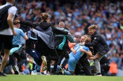 WATCH | Man City fans storm pitch, break goalpost during Premier League title celebrations