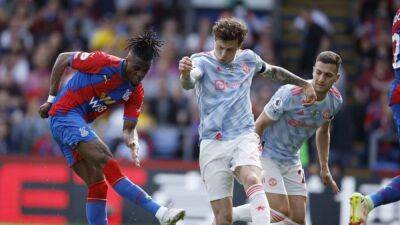 Ralf Rangnick - Wilfried Zaha - Patrick Vieira - Man United book Europa League spot despite 1-0 defeat at Palace - channelnewsasia.com - Manchester