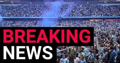 Two football fans charged after Manchester City’s pitch invasion during Premier League title win