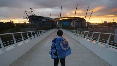 Two men charged following pitch invasion at City's win over Villa