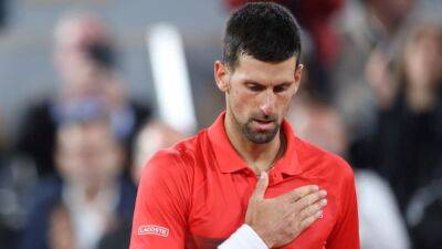 Holder Djokovic eases past Nishioka into round two at French Open