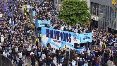 Manchester City's 'legends' celebrate Premier League title with open-top bus parade