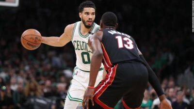 Jayson Tatum - Marcus Smart - Jayson Tatum runs rampant as Celtics dominate Heat 102-82 in Game 4 - edition.cnn.com -  Boston - county Miami