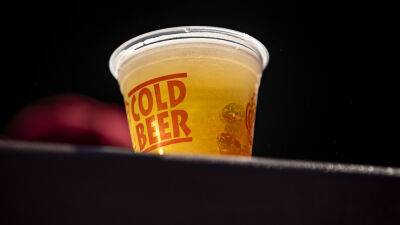 Reds fan accidentally catches foul ball in beer cup, chugs game-flavored beverage