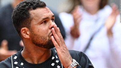 Roger Federer - Rafael Nadal - Roland Garros - Casper Ruud - Jo Wilfried Tsonga - Philippe Chatrier - Jo-Wilfried Tsonga in tears as he ends remarkable career after French Open defeat - edition.cnn.com - France - Norway