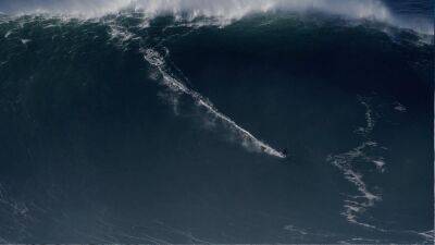 Watch: German surfer breaks world record for biggest wave ever surfed - euronews.com - Germany - Portugal - Brazil - county Sebastian