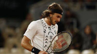 Tsitsipas survives first-round scare to progress in Paris