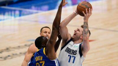 Doncic, Mavs get past Warriors to avoid sweep
