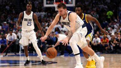Mavericks escape sweep, force Game 5 behind Doncic's lead in win over Warriors