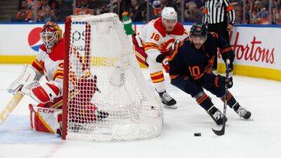 Connor Macdavid - Leon Draisaitl - Elias Lindholm - Darryl Sutter - Jacob Markstrom - Mike Smith - Flames not going away easy despite loss to Oilers in Game 4 - tsn.ca