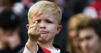Feyenoord fan famous for 'middle-finger' as five-year-old recreates photo 20 years on