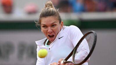 Simona Halep - Roland Garros - Jelena Ostapenko - Danielle Collins - Former champion Halep knocked out by Chinese teenager Zheng - channelnewsasia.com - France - Usa - Australia - China - Romania - Melbourne - Latvia - county Rogers - county Shelby