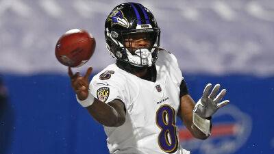 Ravens' John Harbaugh weighs in on Lamar Jackson's absence from OTA's