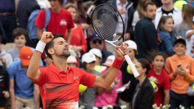 Novak Djokovic and Rafael Nadal race into round four at French Open