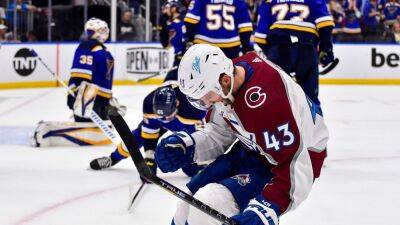 Darren Helm's late goal shocks St. Louis Blues, sends Colorado Avalanche to West finals for first time in 20 years