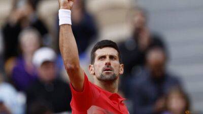 Impressive Djokovic canters into French Open last eight, Nadal clash looms
