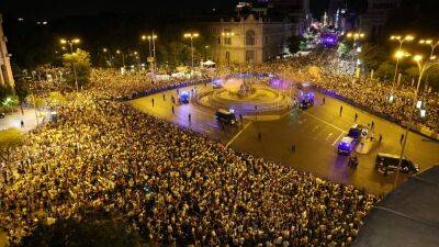 Real Madrid fans party all night after Champions League triumph - in pictures - thenationalnews.com - Spain -  Santiago