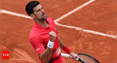 Novak Djokovic eases into Rafael Nadal quarter-final at French Open