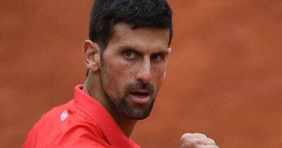 Djokovic jeered but into French Open quarter-finals for 13th straight year