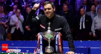 Ronnie O'Sullivan sees off Judd Trump to win seventh snooker world title