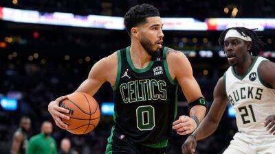 Jayson Tatum - Marcus Smart - 2022 NBA Playoffs -- Betting Tips for Bucks-Celtics, Warriors-Grizzlies Game 2 - espn.com -  Boston - Jordan
