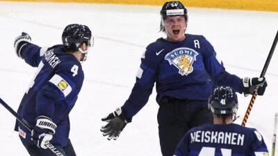 Finland follows first Olympic hockey gold with world title; U.S. loses bronze game
