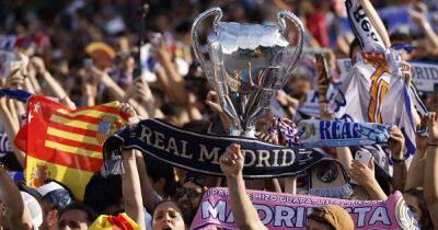 Soccer-Thousands of Real Madrid fans celebrate Champions league title with team