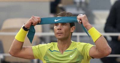 Tennis-Nadal vows to fight in 'big challenge' against Djokovic