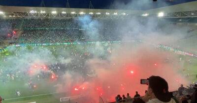 Saint-Etienne fans storm pitch and set off flares as players flee to locker room - msn.com - France