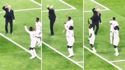 Real Madrid's Carlo Ancelotti dancing with players after Champions League final