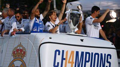 Thousands turn out as Real Madrid celebrate Champions League triumph with bus parade