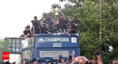 Gujarat Titans take out victory parade on open-top bus, meet state CM