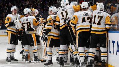 Evgeni Malkin, Pittsburgh Penguins edge New York Rangers in overtime thriller as backup goalie Louis Domingue delivers