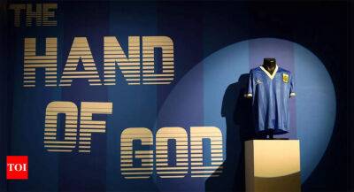 Maradona's 'hand of God' World Cup jersey auctioned for $9.3 million: Sotheby's - timesofindia.indiatimes.com