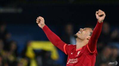Liverpool's 'mentality monsters' flex muscles to keep quadruple bid alive