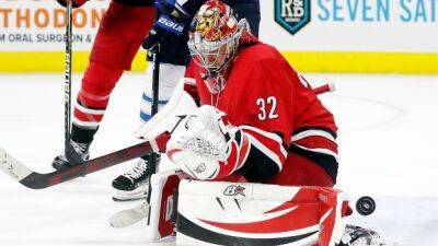 Hurricanes G Raanta leaves Game 2 after collision with Bruins F Pastrnak