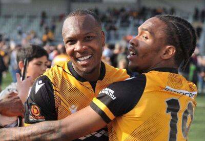 Maidstone United duo Gavin Hoyte and George Elokobi will lift National League South trophy together